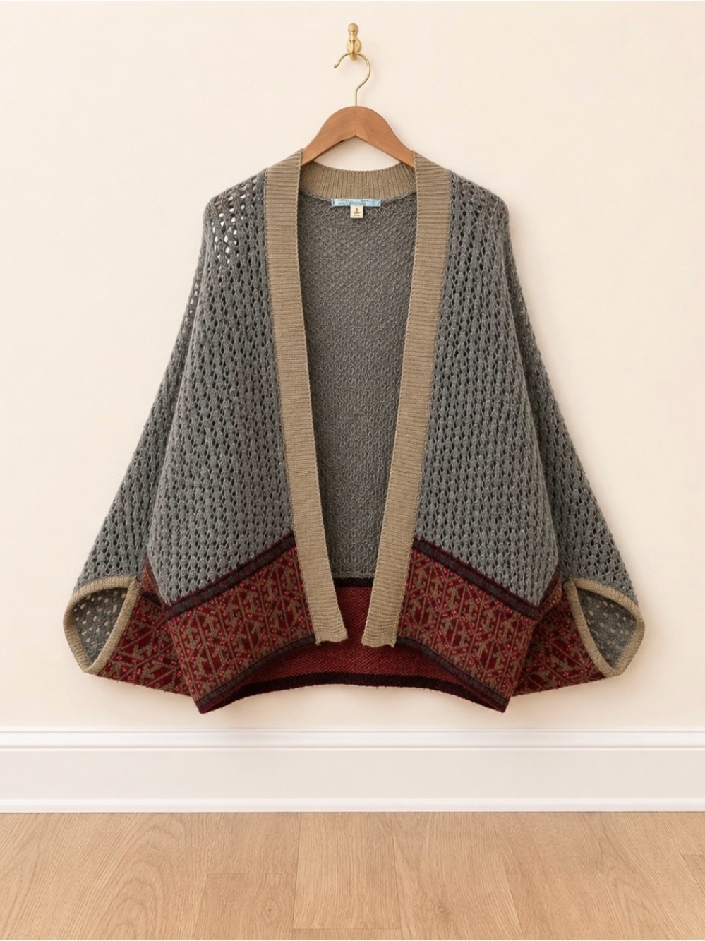 Open-Knit Gray Cardigan with Rust Patterned Hem